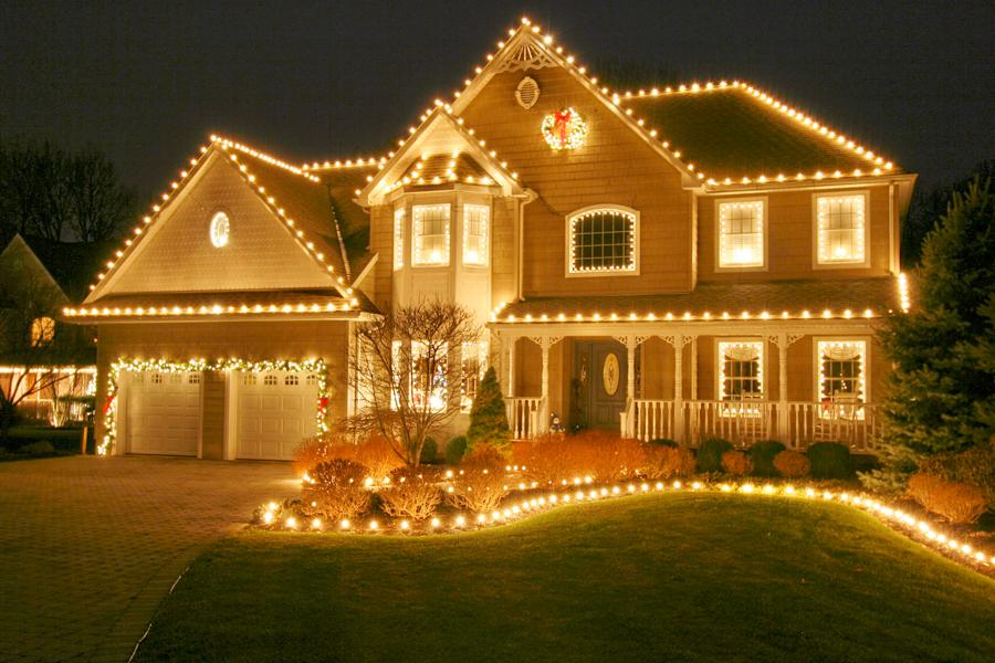 Professional Christmas light installation in progress